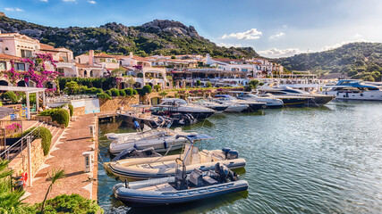 The scenic harbor of Poltu Quatu, Costa Smeralda, Sardinia, Italy - obrazy, fototapety, plakaty