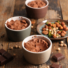 chocolate mousse- vegan chocolate dessert on wood background