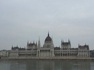Fototapeta na wymiar The Hungarian Parliament near river Danube in Budapest