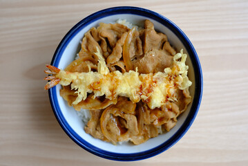 Japanese grilled beef with rice (Gyu Donburi) on wooden table : Top view.