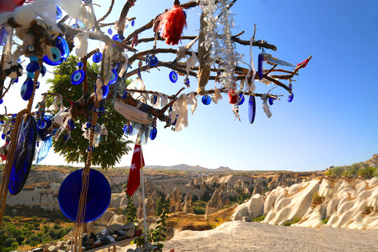 Blue eye-shaped amulets made of blue glass. Devil eye charm to protect against the bad energy in Goreme Cappadocia, Turkey.