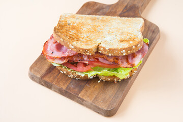 A BLT is a type of sandwich, named for the initials of its primary ingredients, bacon, lettuce and tomato