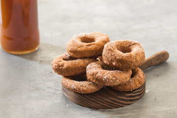 Homemade donuts sugar glazed on a stone background