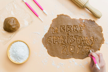Christmas cookies with the letters Merry Christmas 2021