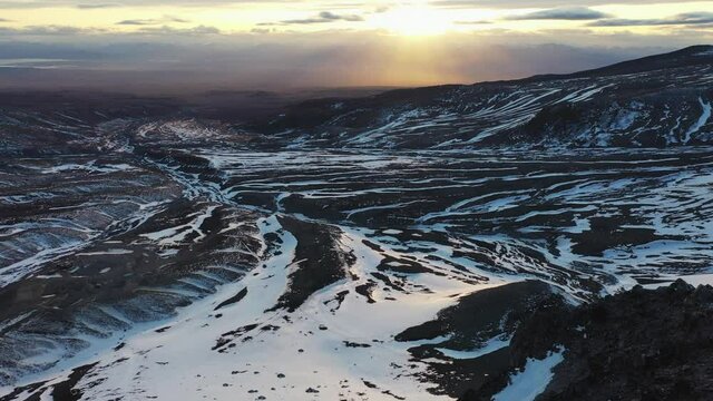 Autumn in Kamchatka, Russia, beautiful sunrise and sunset rays, stunning volcanic terrain, Avachinsky volcano.