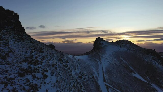 Autumn in Kamchatka, Russia, beautiful sunrise and sunset rays, stunning volcanic terrain, Avachinsky volcano.