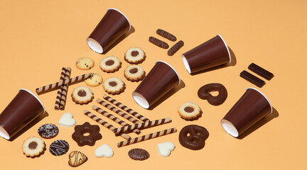 Chocolate cookies and plastic cap background. Winter holiday time. Minimal still life art. Christmas concept