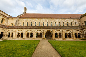 Fototapeta premium Ancient marble Column corridor of a medieval French abbey. Abbey of Fontenay, Burgundy, France, Europe