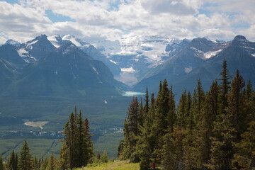 View of Mount Victoria with Victoria Glacier surrounding The Lake Louise  viewing from top of Lake Louise Ski Resort during summer  in Banff National Park, Canadian Rockies, Alberta, Canada.