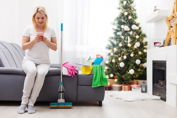 Young female cleaning after party