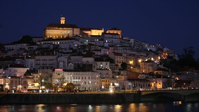 University of Coimbra as seen from across the Mondego river and the bridge