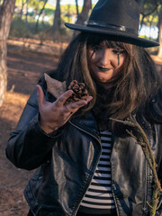 Woman posing in disguise for Halloween in a forest