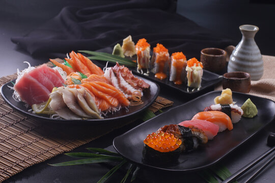 Sashimi and sushi Japanese food set. Salmon, Ikura, wasabi, fish, shrimp and tuna.