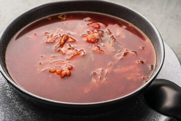 Vegetarian borscht in a concrete plate close-up