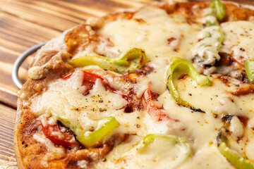 Pizza with paprika and bell pepper without meat, close-up