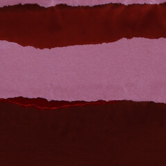 Red vintage and old looking crumpled paper background. Retro cardboard texture. Grunge paper for drawing. Ancient book page. Present wrapping.