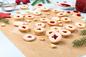 Traditional Austrian christmas cookies - Linzer biscuits filled with raspberry jam.