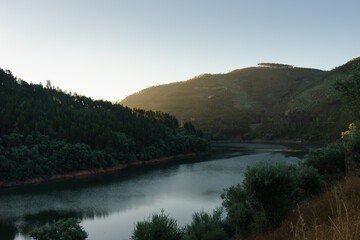 Obraz premium River in the mountains at sunrise 