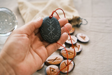 rune stone good luck and riches talisman with runescript - obrazy, fototapety, plakaty