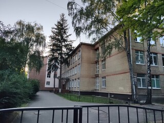 the territory of the old brick school with a yard