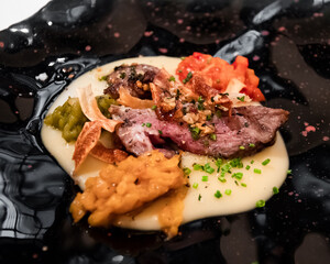 Piece of meat served on a restaurant