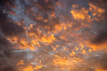 orange clouds at sunset. evening sky. sunset