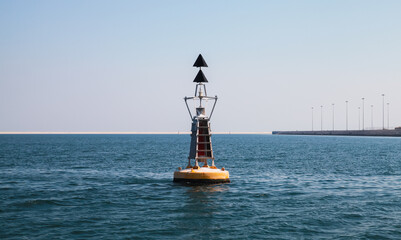 North Cardinal buoy is on sea water © evannovostro