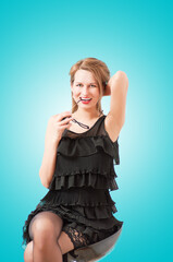 Fototapeta premium a beautiful woman posing and smiling coquettishly