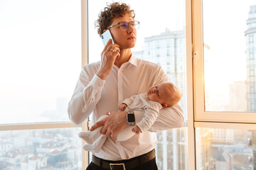 Young smiling father businessman