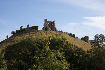 Fototapeta na wymiar The remains of Corfe Castle in Corfe in Dorset in the United Kingdom