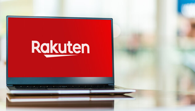 Laptop computer displaying logo of Rakuten