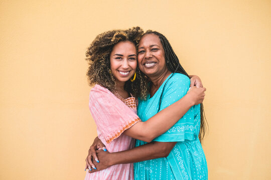 Portrait of cheerful african mother and adult daughter together - Family, mother and child love