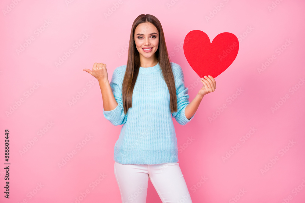 Sticker photo of attractive lady hold big paper red heart direct thumb finger empty space advice creative po