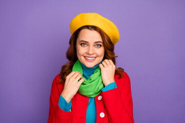 Close-up portrait of her she nice-looking fashionable attractive lovely charming pretty cheerful cheery wavy-haired girl fixing scarf isolated over violet lilac purple pastel color background