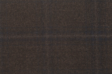 dark brown and gray tartan fabric texture background macro