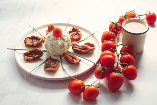 Delicious rustic breakfast - farm boursin goat cheese with sun-dried tomato,shallot onion and fresh cherry tomatoes