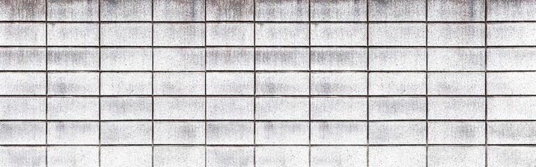 Panorama of white cement block fence seamless background and pattern