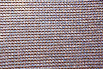 Fabric mesh of fine interwoven threads of gray color.