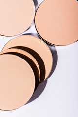 close up view of face powder on white background