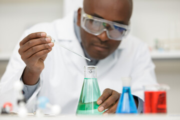 Fototapeta premium professional chemist man doing tests