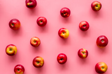 Fruit pattern of red apples on table desk top view