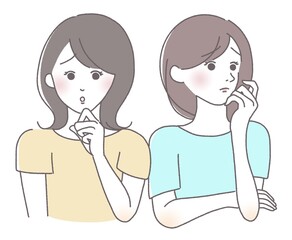 不安な顔の女性達　二人組
