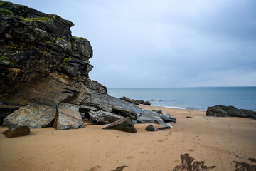 A rocky sandy beach off the coast of France.