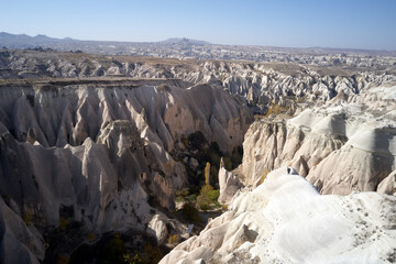 View over the volcanic rock formations. Amazing rocky landscape in Cappadocia, Turkey.