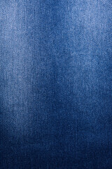 Texture of dark grated denim as background. Close-up