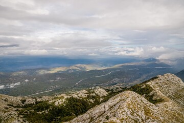 View from the mountain Biokovo. Mountain landscape with low clouds. Croatia