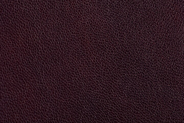 Natural skin is dark maroon. Texture, background.