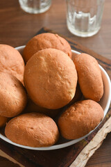 Crispy rusk, cake rusk. butter cookies or biscuits. Heap of round bruschette rusks. Round brioche bread toasts. Crunchy Rusk or Toast for healthy life.  Fresh baked tasty Homemade snacks Kerala India