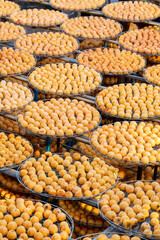 Making process of sun exposuring dried persimmon in a sieve in autumn.