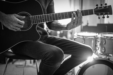 Obraz na płótnie Canvas Man Hands Play Acoustic Guitar .